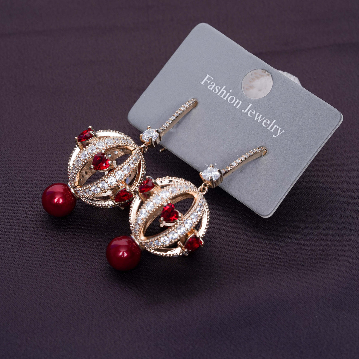 Golden Ruby Orbit Earrings