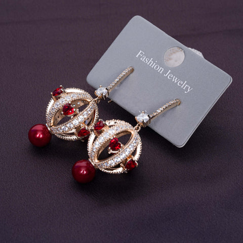 Golden Ruby Orbit Earrings