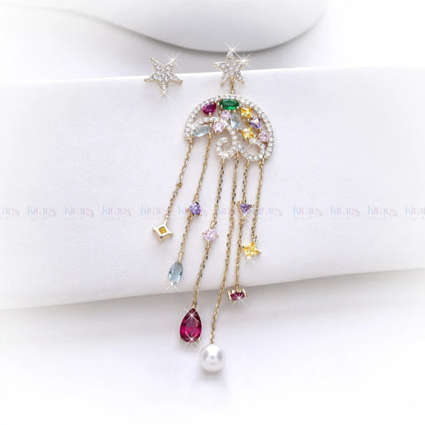 Elegant earrings with gemstones on a white background