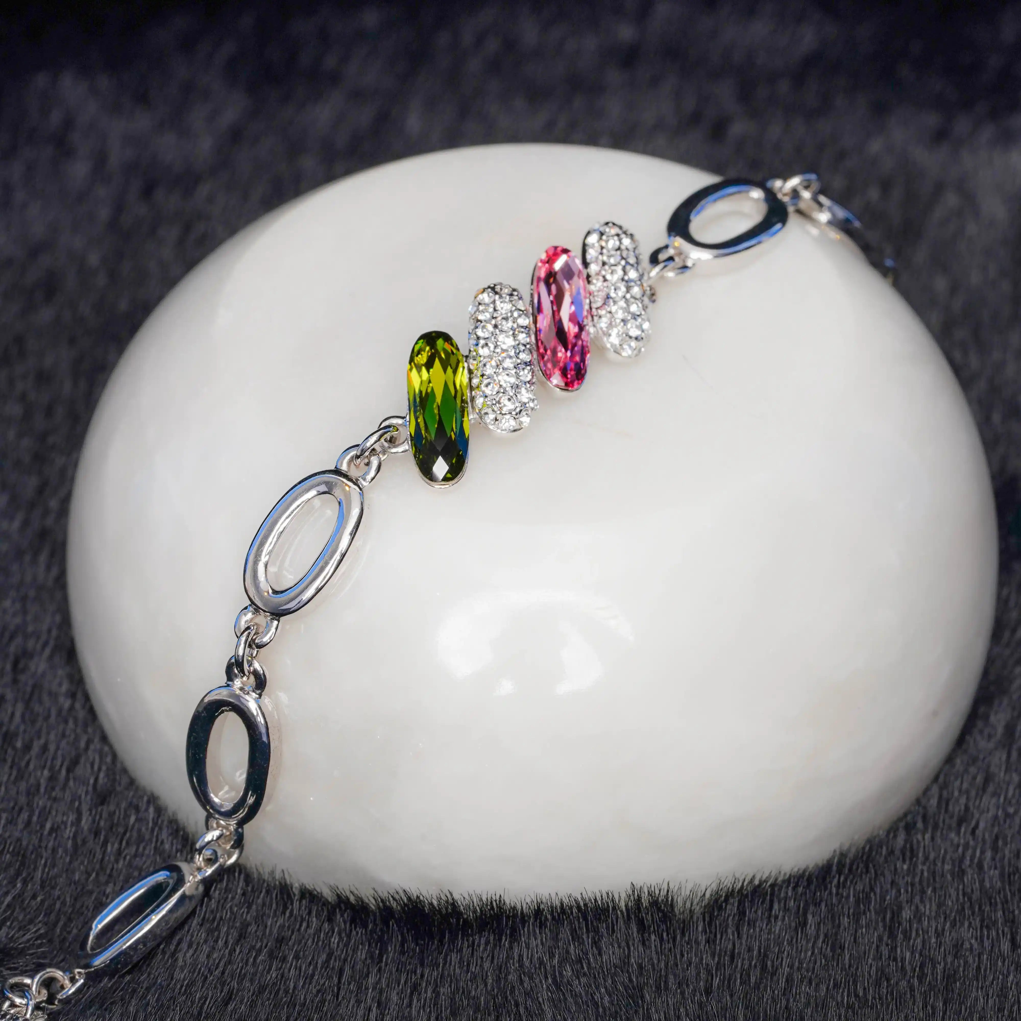 Bracelet with colorful beads on a white stone