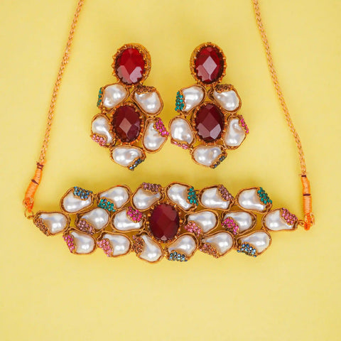 Jewelry set with necklace and earrings on a yellow background