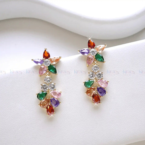 Multicolored gemstone earrings on a white background